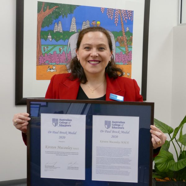 Macaulay surprised by education medal presentation